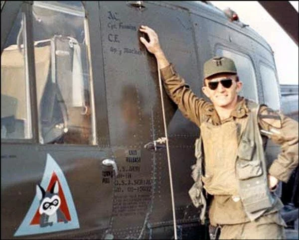Martin Fanning next to his helicopter