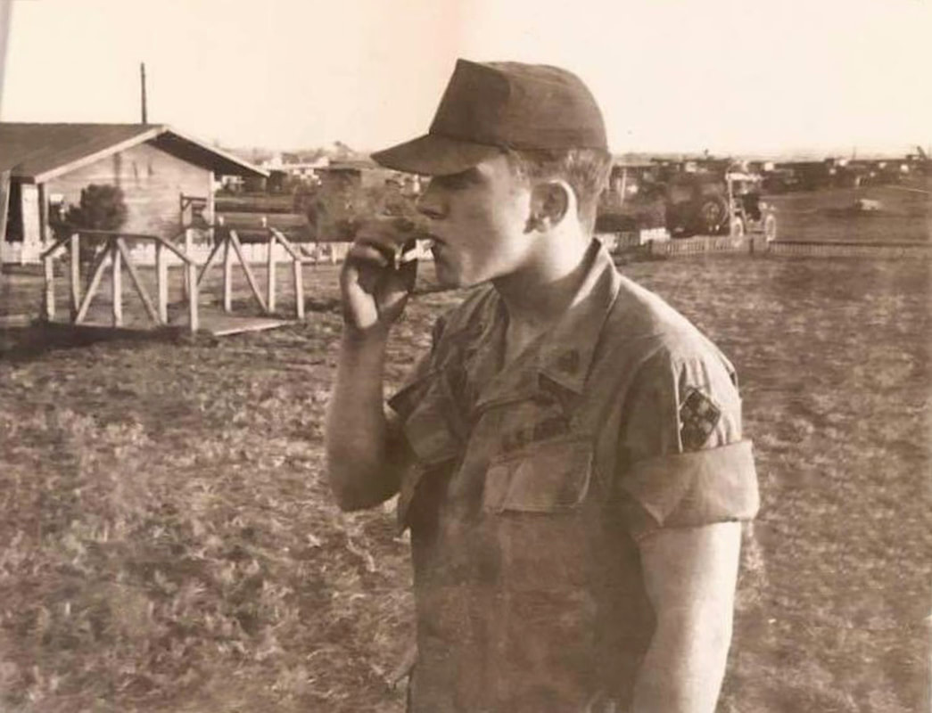 Richard Colburn unwinding with a smoke.
