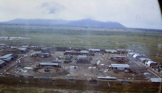 Elevated view of the base, distant mountains behind