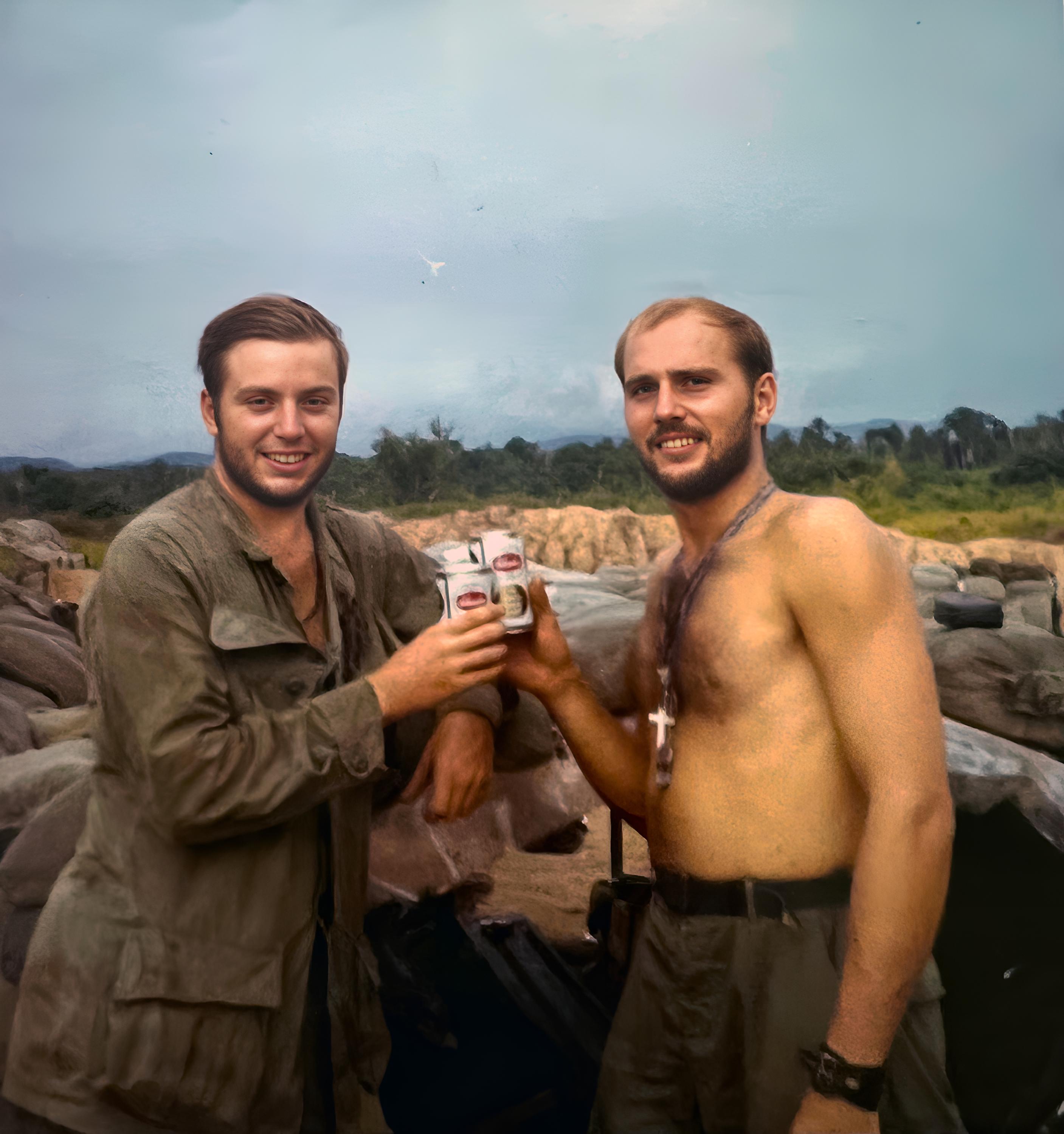 Larry Randt (L) and Ted Hryniw (R) from Cat Platoon enjoying a beer