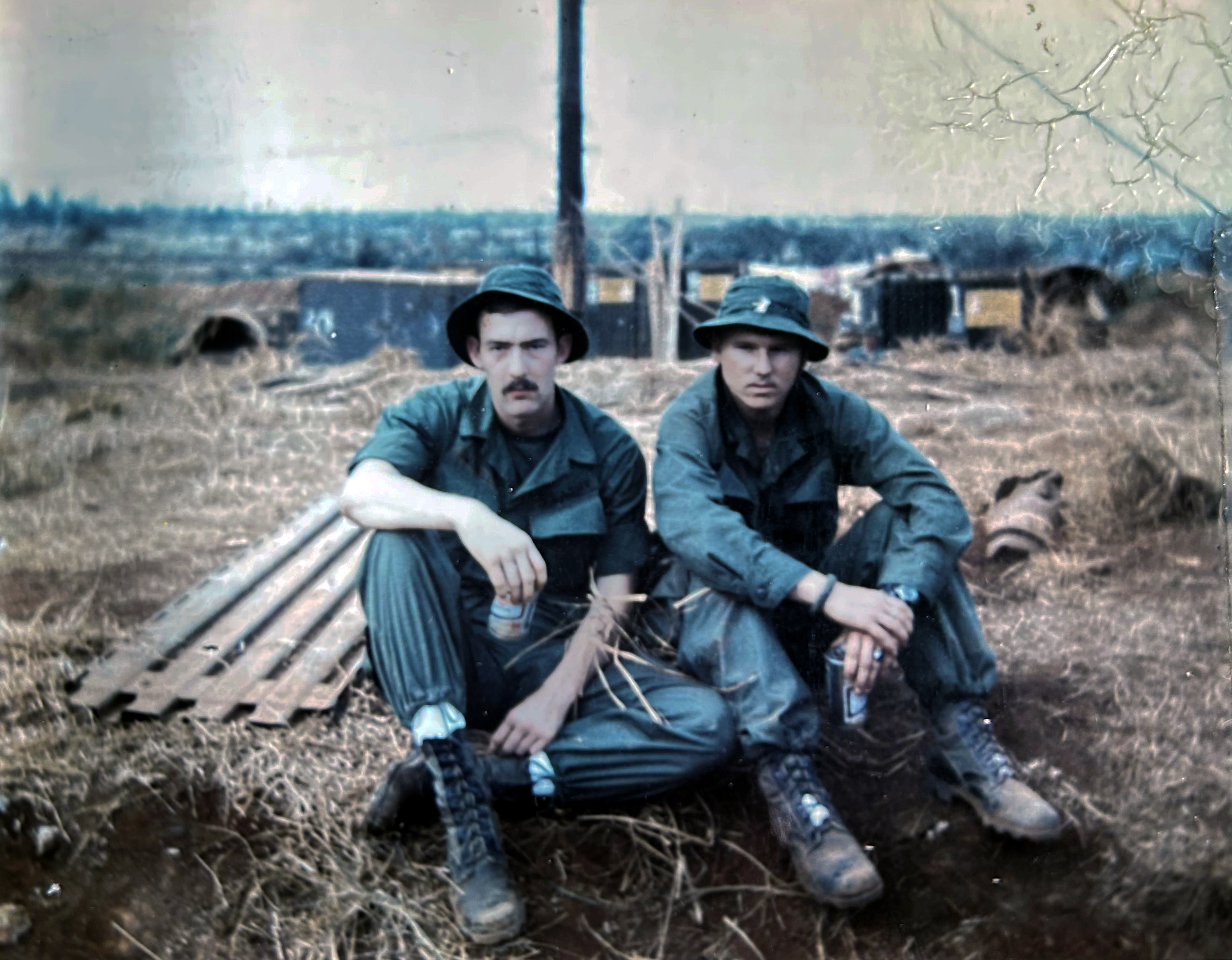 Jim Cardwell (L, Range Platoon) and Ken Weaver (R, Cat Platoon) taking a break during basic training.