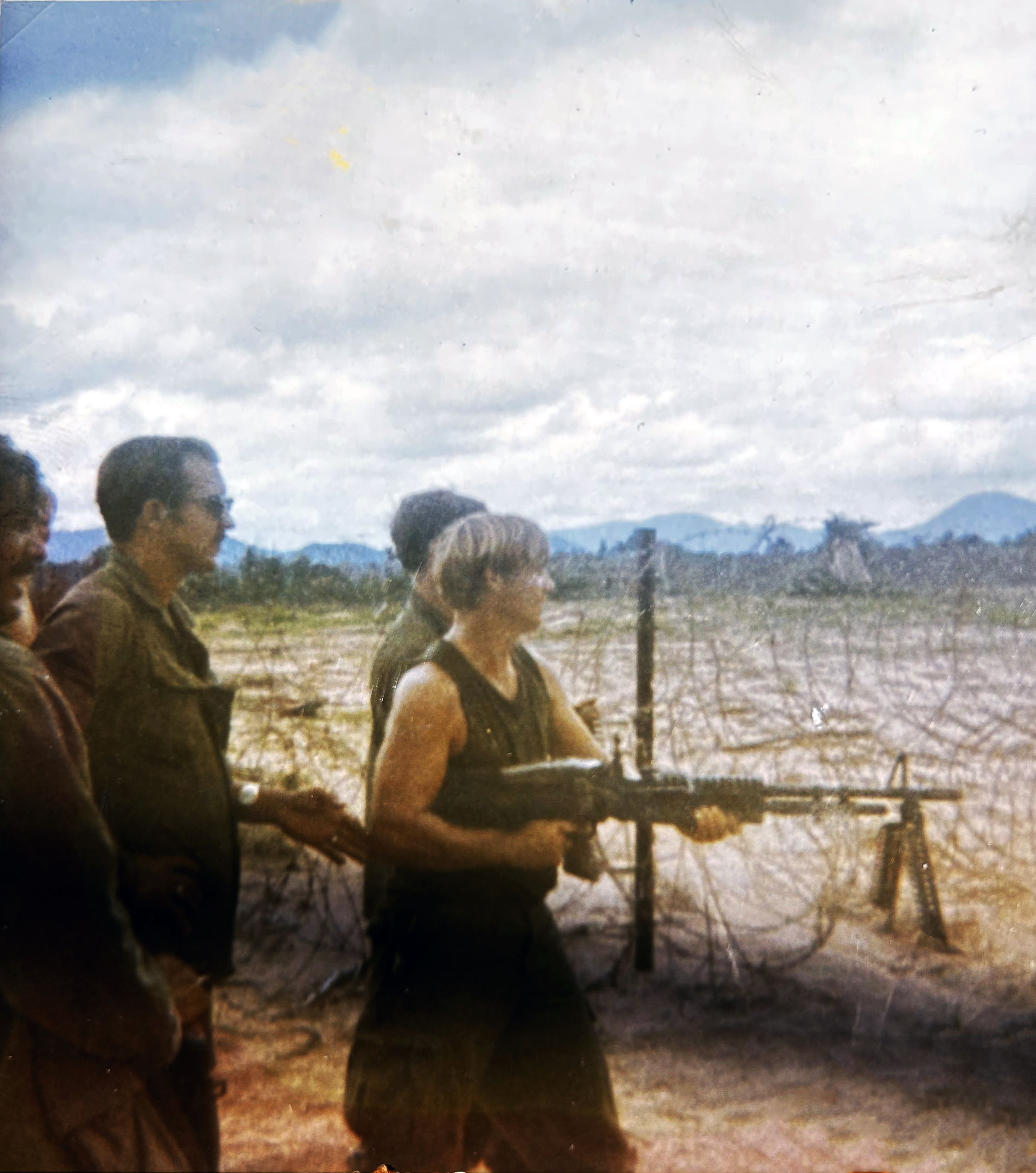 Ken Weaver with his weapon of choice, an M60 machine gun