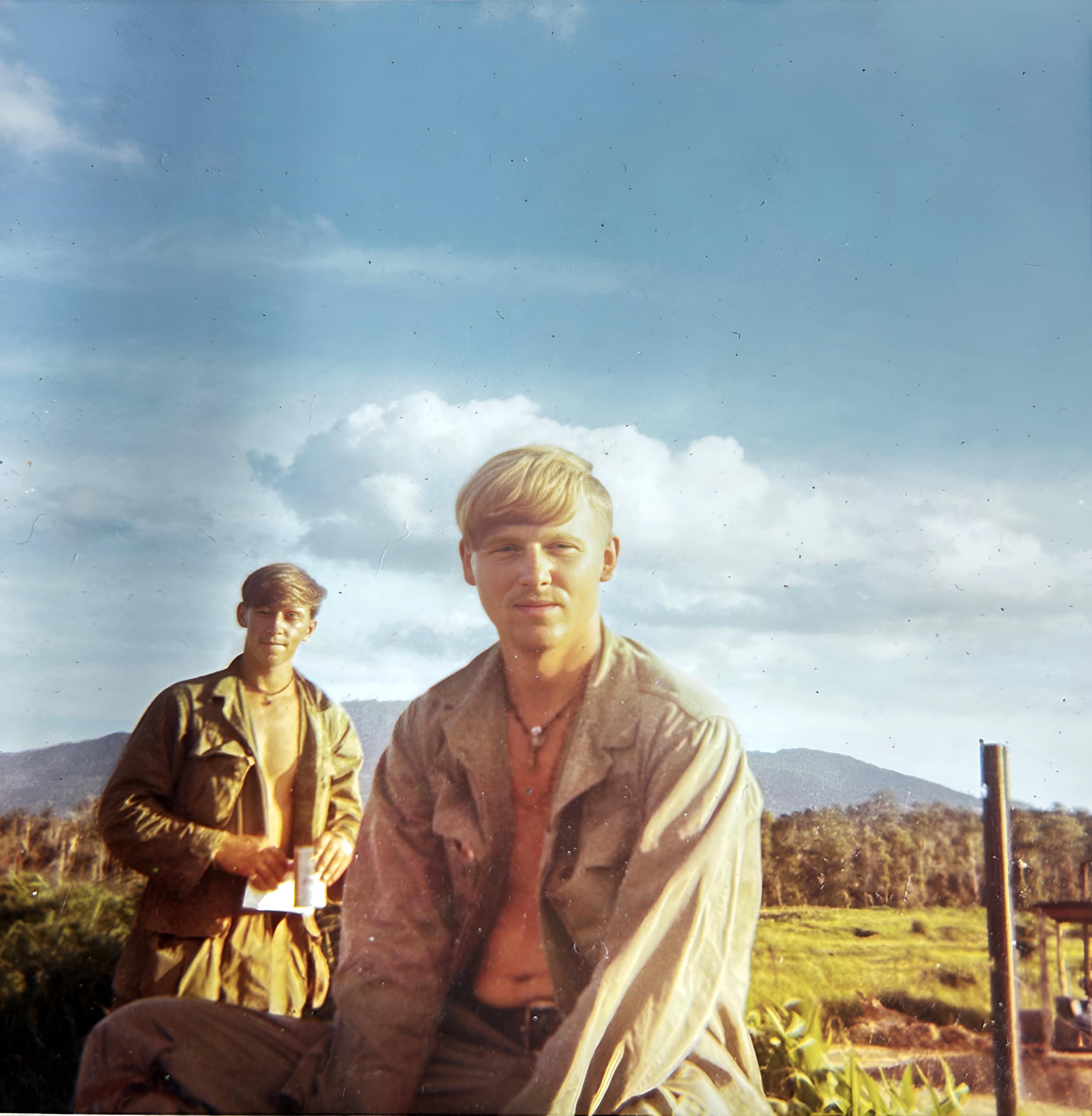 Ken Weaver (center) with John "Peanut" Fults in the Vietnam countryside