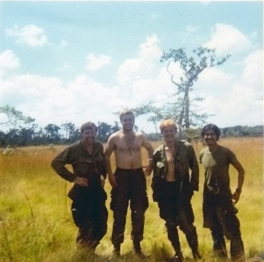 Marvin (far left) with three fellow soldiers — identities unknown