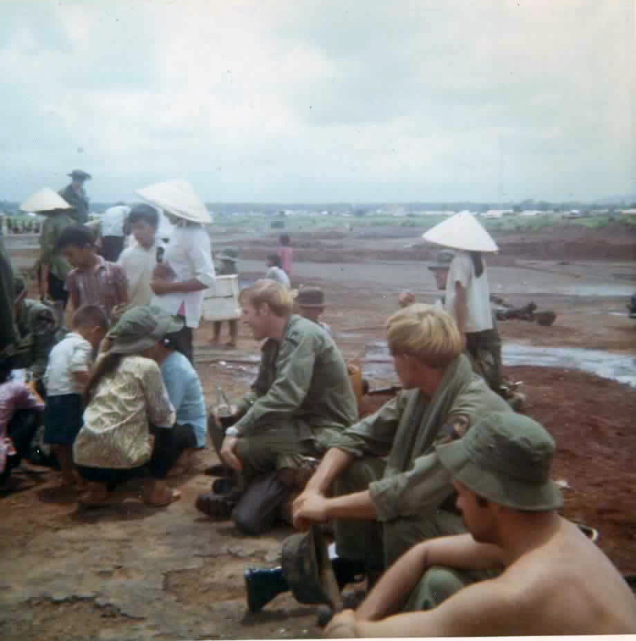 Soldiers and Vietnamese civilians
